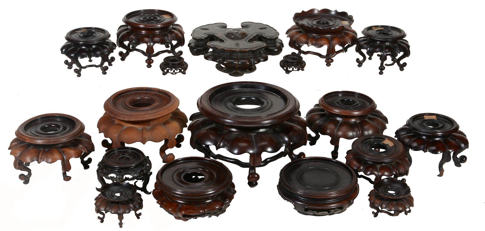 Twenty-one various Chinese hardwood stands  , 19th and 20th century, 5cm to 22cm diam