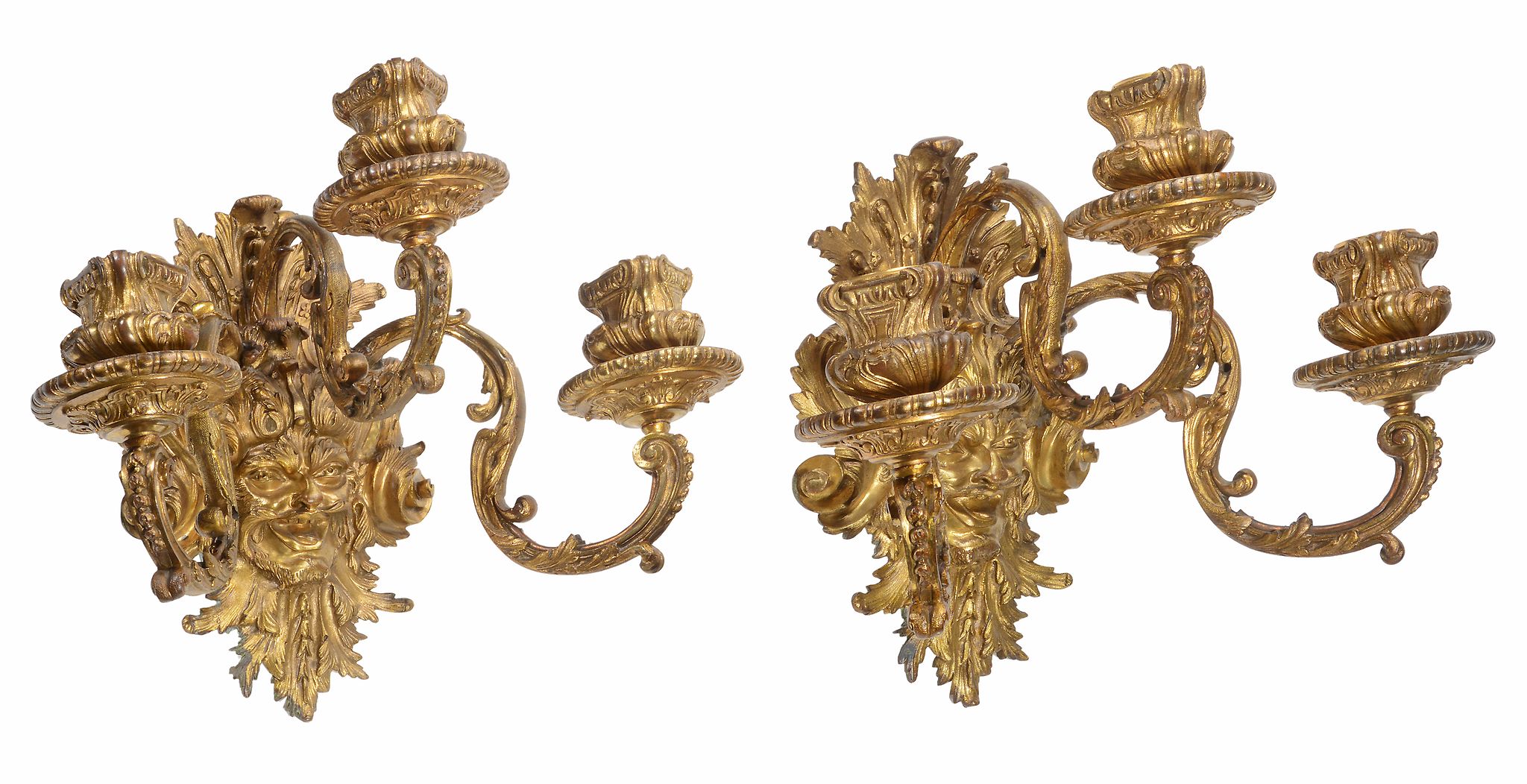 A pair of Continental gilt bronze three light wall appliques  A pair of Continental gilt bronze