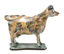 An English pearlware cow-creamer of St. Anthony's Pottery type, circq 1810  An English pearlware