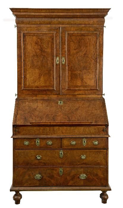 A George I walnut bureau bookcase, circa 1720,