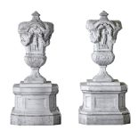 A pair of Italian sculpted white marble urns, 17th century  A pair of Italian sculpted white