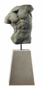 A massive sculpted limestone model of a male torso, after the Gaddi Torso  A massive sculpted