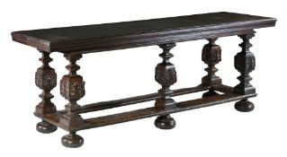 A Dutch carved and stained hardwood side table, early 17th century  A Dutch carved and stained