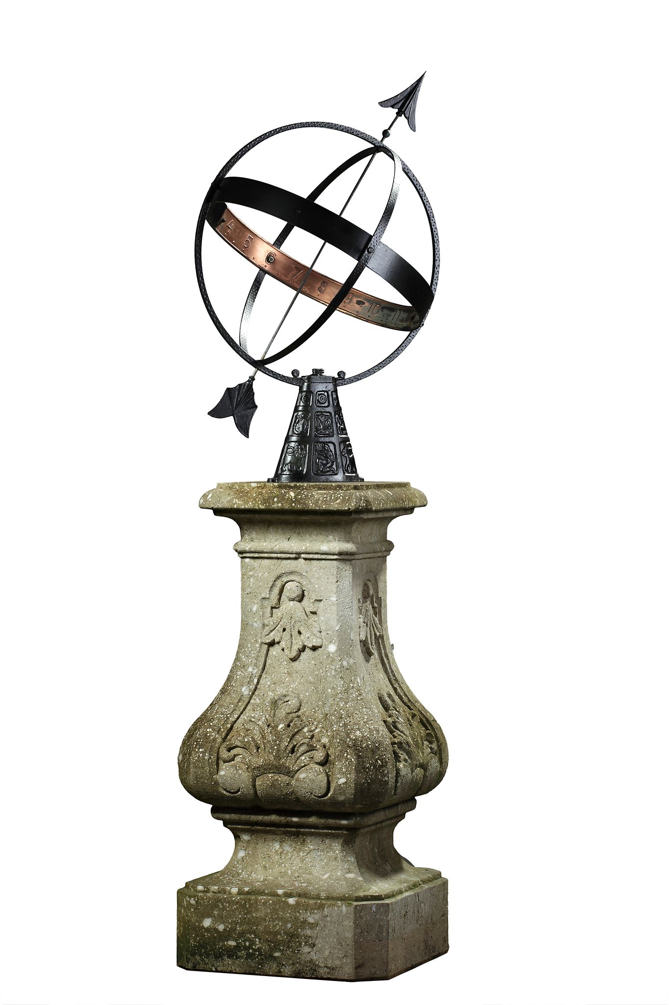 A metal armillary sphere mounted on a carved limestone pedestal  A metal armillary sphere mounted on