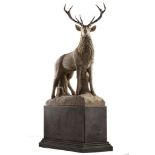 A large and impressive sculpted limestone and antler mounted model of a stag  A large and impressive