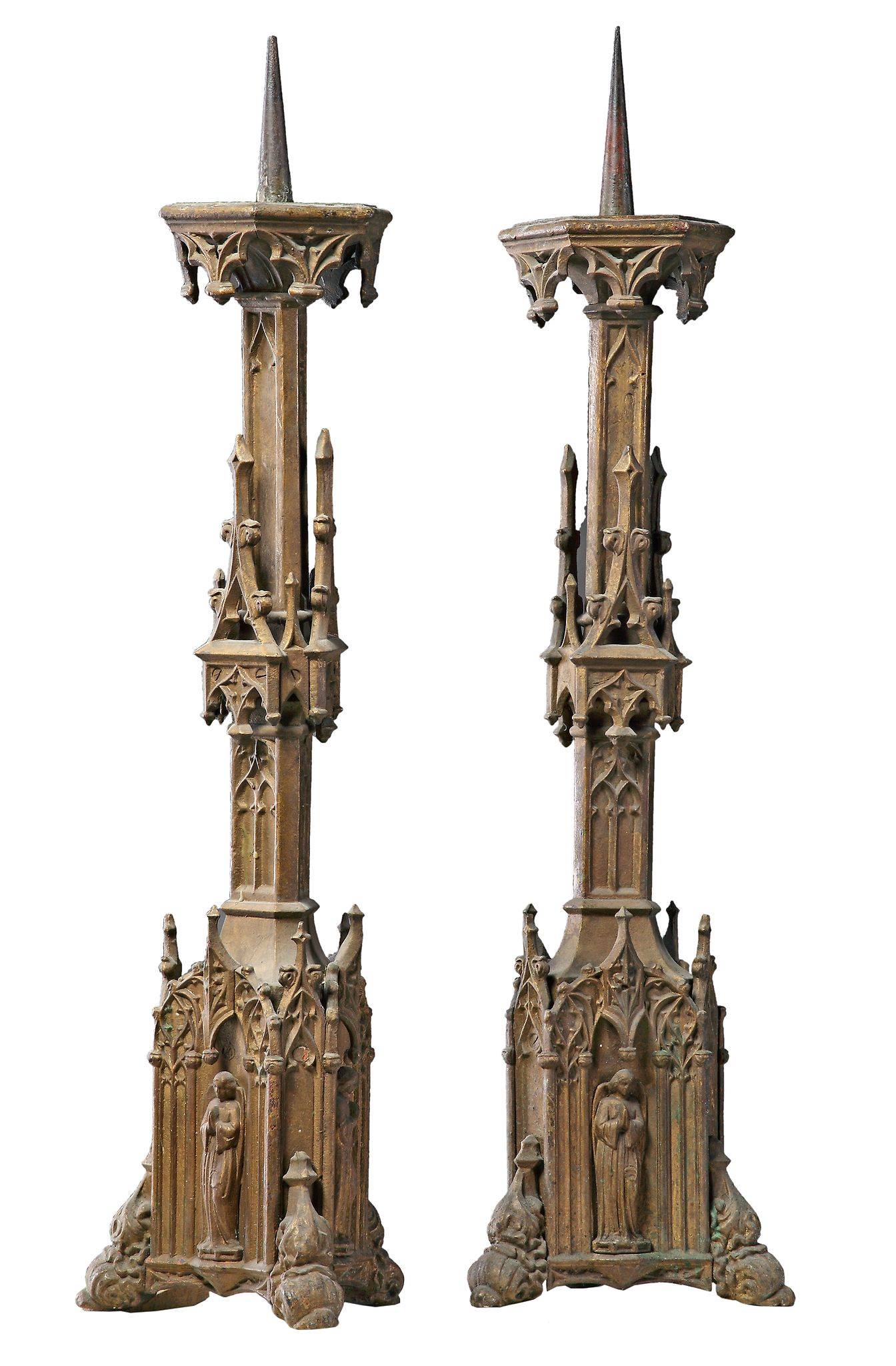 A pair of Continental, probably French gilt cast iron pricket candlesticks...  A pair of