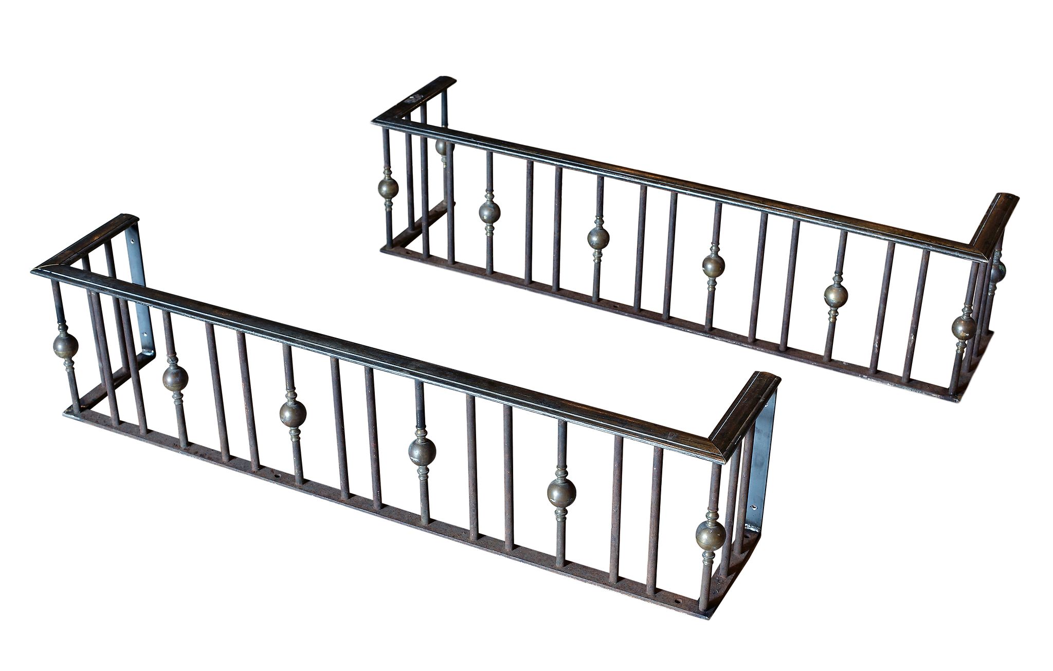 A pair of Dutch wrought iron fenders, 19th century and later adapted  A pair of Dutch wrought iron