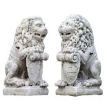 A pair of Italian carved marble models of heraldic lions , late 19th century  A pair of Italian