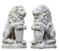 A pair of Italian carved marble models of heraldic lions , late 19th century  A pair of Italian