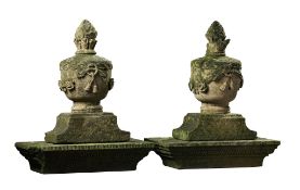 A pair French carved sandstone pier finials, 19th century, modelled as urns  A pair French carved