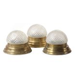 A set of three polished brass and cut glass plafonniers, early 20th century  A set of three polished