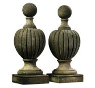 A pair of carved limestone pier finials, 20th century  A pair of carved limestone pier finials,