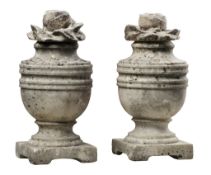 A pair of Continental carved marble urn finials, 20th century  A pair of Continental carved marble