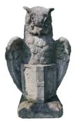 A Continental stone composition model of an owl with an open book  A Continental stone composition