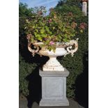 A French white painted cast iron twin handled urn  A French white painted cast iron twin handled