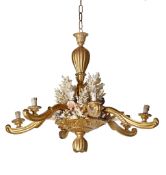 A Continental carved and giltwood and coral mounted six light chandelier  A Continental carved and