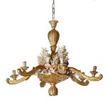 A Continental carved and giltwood and coral mounted six light chandelier  A Continental carved and
