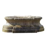 A Bourgogne stone planter, 19th century, of oval section with projecting...  A Bourgogne stone