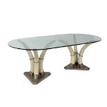 A glass topped, resinous faux ivory and metal mounted dining table  A glass topped, resinous faux