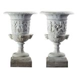 A pair of large Continental sculpted white marble urns, late 19th century  A pair of large