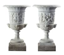 A pair of large Continental sculpted white marble urns, late 19th century  A pair of large