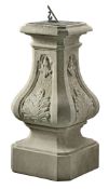 A Continental carved grey stone and bronze mounted sundial, early 20th century  A Continental carved