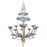 A Continental painted, carved wood and composition ten light chandelier in...  A Continental