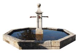 A carved limestone fountain and pool surround, 20th century  A carved limestone fountain and pool