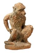 A Continental sculpted terracotta garden model of a seated monkey, 20th century  A Continental