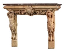 A Continental sculpted terracotta and marble mounted chimneypiece in...  A Continental sculpted