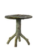 A stone composition faux bois garden table , late 19th century  A stone composition  faux bois