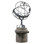 A Continental metal and limestone mounted armillary sphere, early 20th century  A Continental