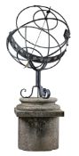 A Continental metal and limestone mounted armillary sphere, early 20th century  A Continental