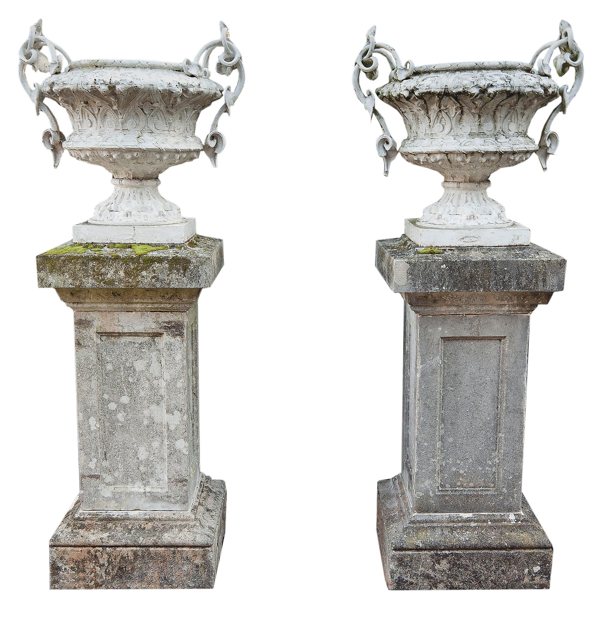 A large pair of French white painted cast iron twin handled urns, 19th century A large pair of