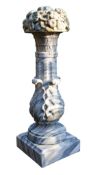 A carved grey and white variegated marble fountain, late 19th century  A carved grey and white