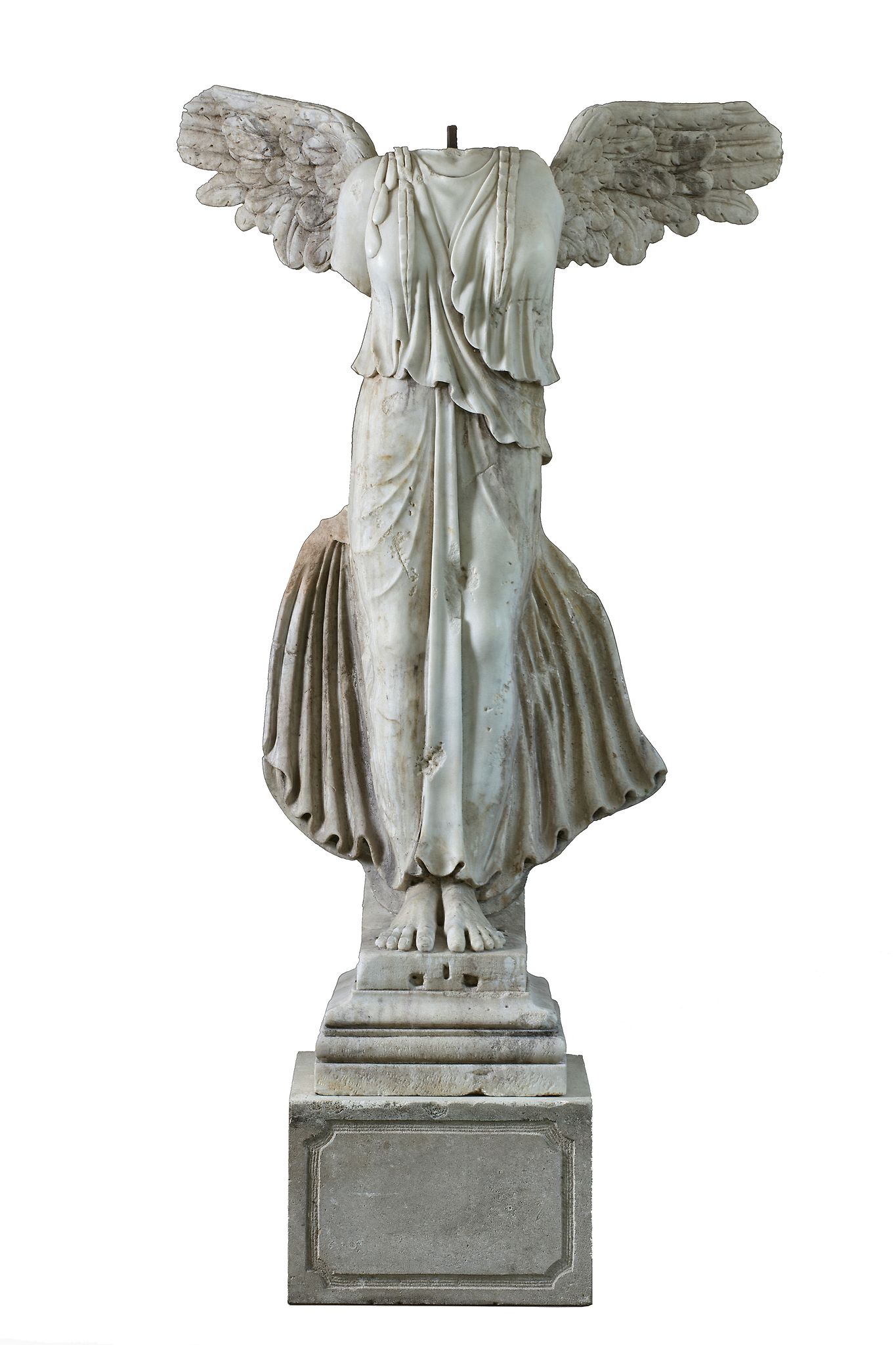 A sculpted marble figure of a winged female Victory, a Nike  A sculpted marble figure of a winged