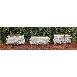 A near set of three carved carrara marble planters, late 19th century  A near set of three carved