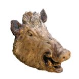 A Continental sculpted terracotta model of a wild boar's head  A Continental sculpted terracotta