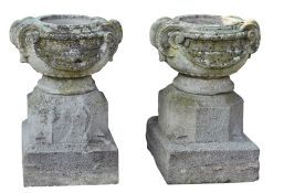 A pair of Continental carved sandstone planters, 18th century  A pair of Continental carved