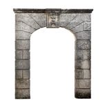 A Continental ashlar carved limestone archway, 19th century  A Continental ashlar carved limestone