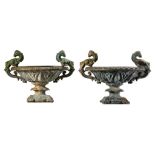 A pair of Continental cast iron twin handled garden urns, late 19th century  A pair of Continental