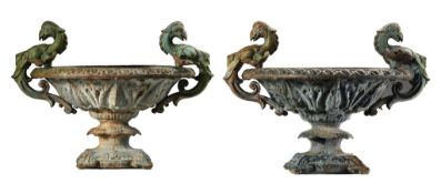 A pair of Continental cast iron twin handled garden urns, late 19th century  A pair of Continental