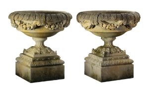 A pair of large Continental carved limestone garden urns, 20th century  A pair of large