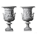 A pair of monumental Italian sculpted white marble urns in the manner of the...  A pair of