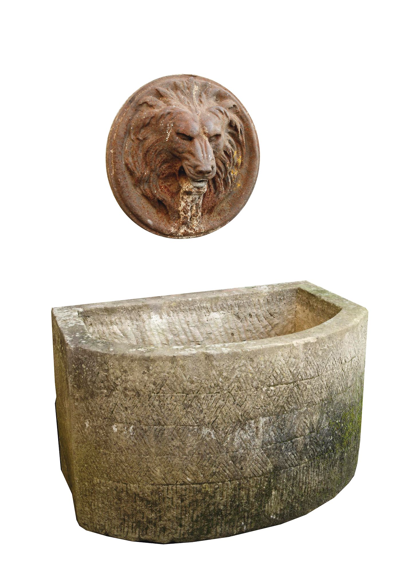 A cast iron lion mask wall mounting fountain head above an associated stone...  A cast iron lion