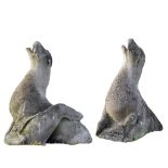 A pair of sculpted limestone models of seals, 19th century  A pair of sculpted limestone models of