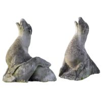 A pair of sculpted limestone models of seals, 19th century  A pair of sculpted limestone models of