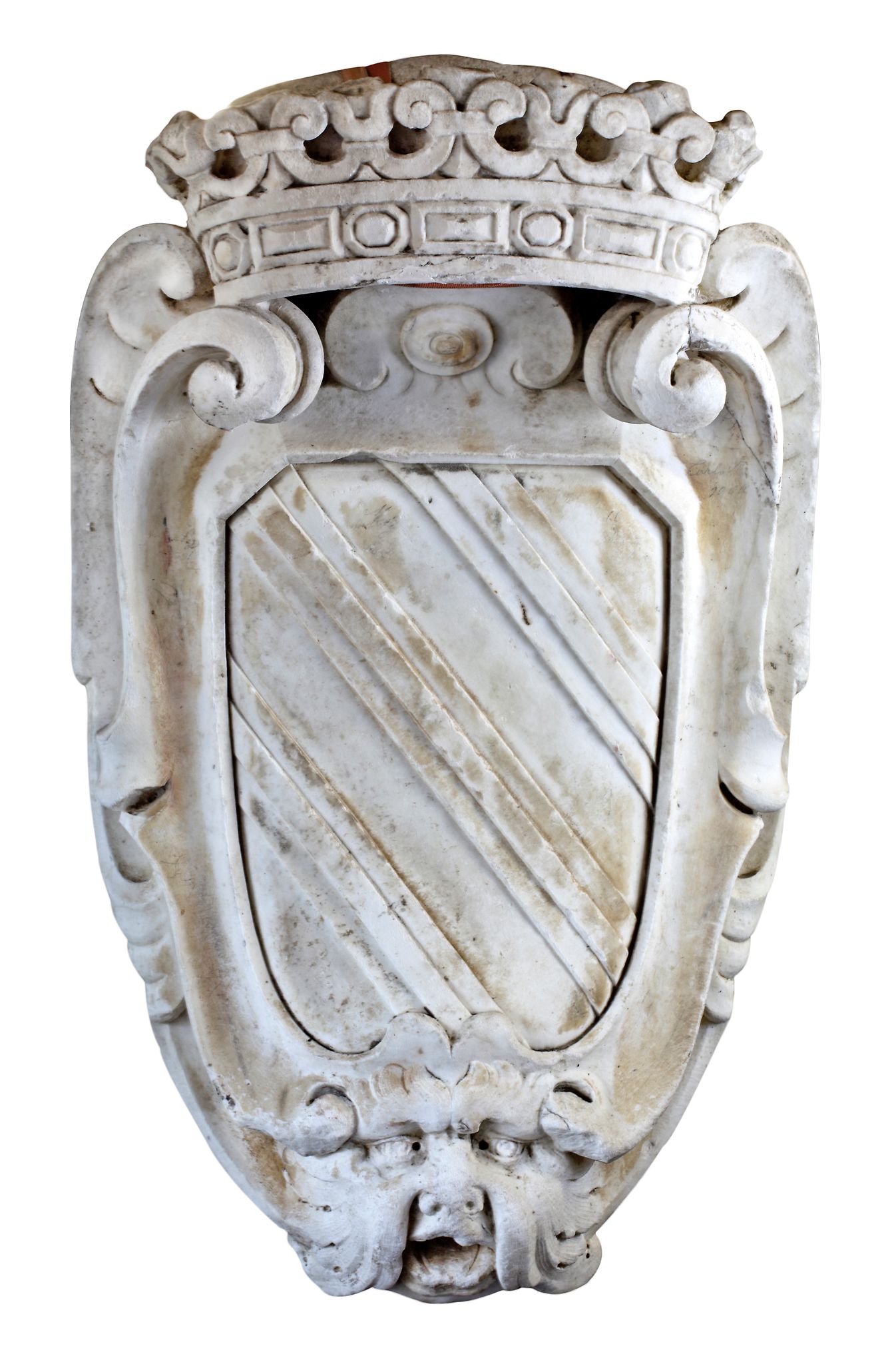 An Italian carved Carrara marble wall mounting armorial panel, 17th century  An Italian carved