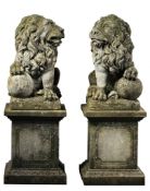 A pair of sculpted limestone models of lions on pedestals, 20th century  A pair of sculpted