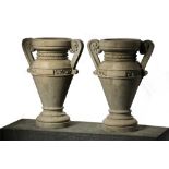 A pair of Italian carved Istrian stone urns, late 19th century  A pair of Italian carved Istrian